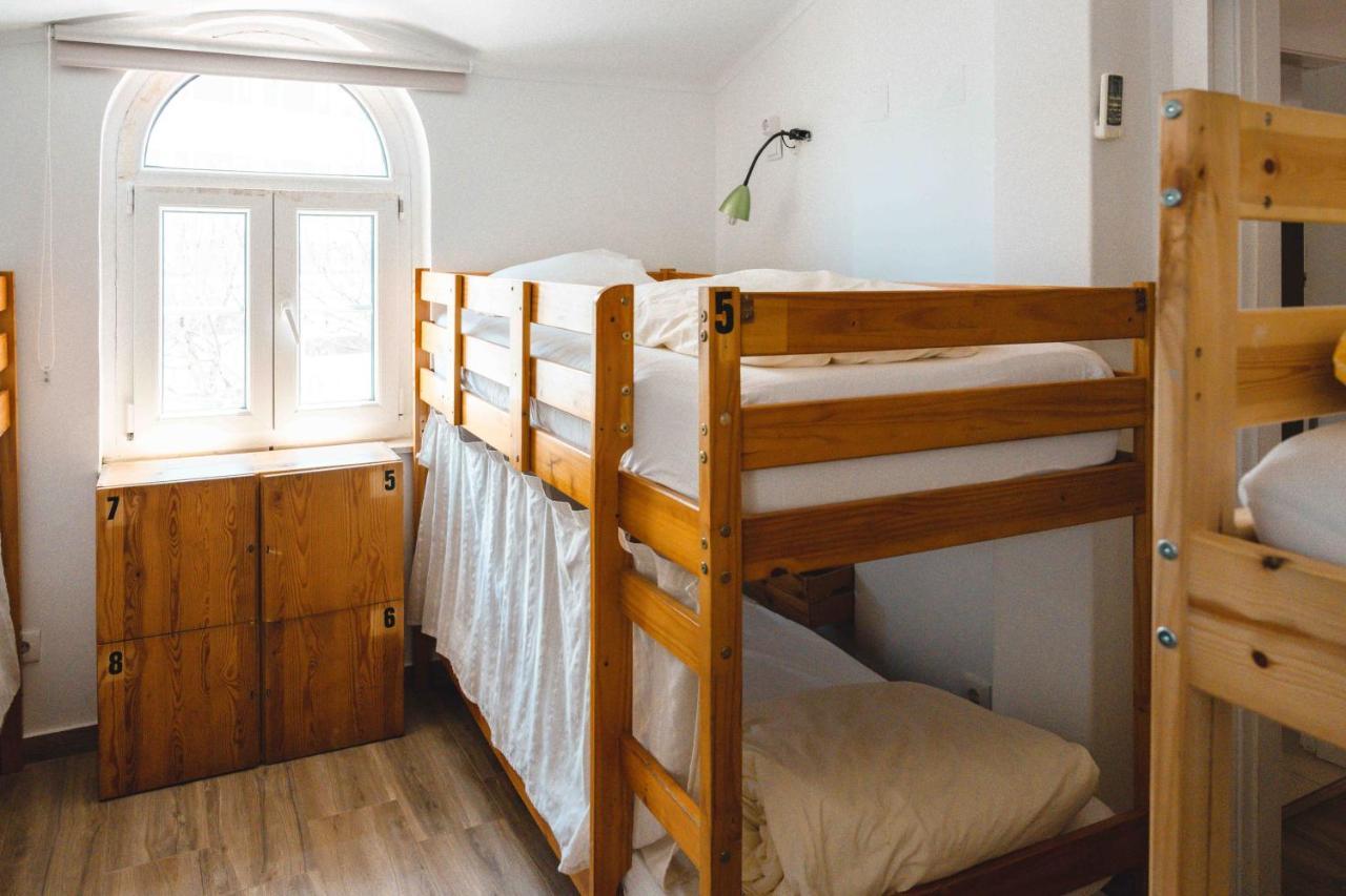 Cama em Beliche num Dormitório Misto
